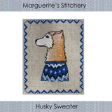 cross stitch design featuring a Husky dog in a blue patterned sweater