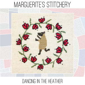 cross stitch design featuring a dancing sheep within a wreath of red flowers