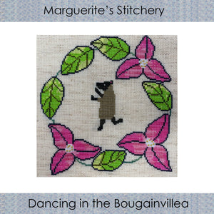 cross stitch design showing a dancing sheep in a wreath of pink flowers and green leaves