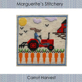 cross stitch of a rabbit farmer on a red tractor over a field of carrots with a red barn in the background