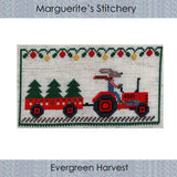 cross stitch design featuring a rabbit farmer on a red tractor with a cart of evergreen trees